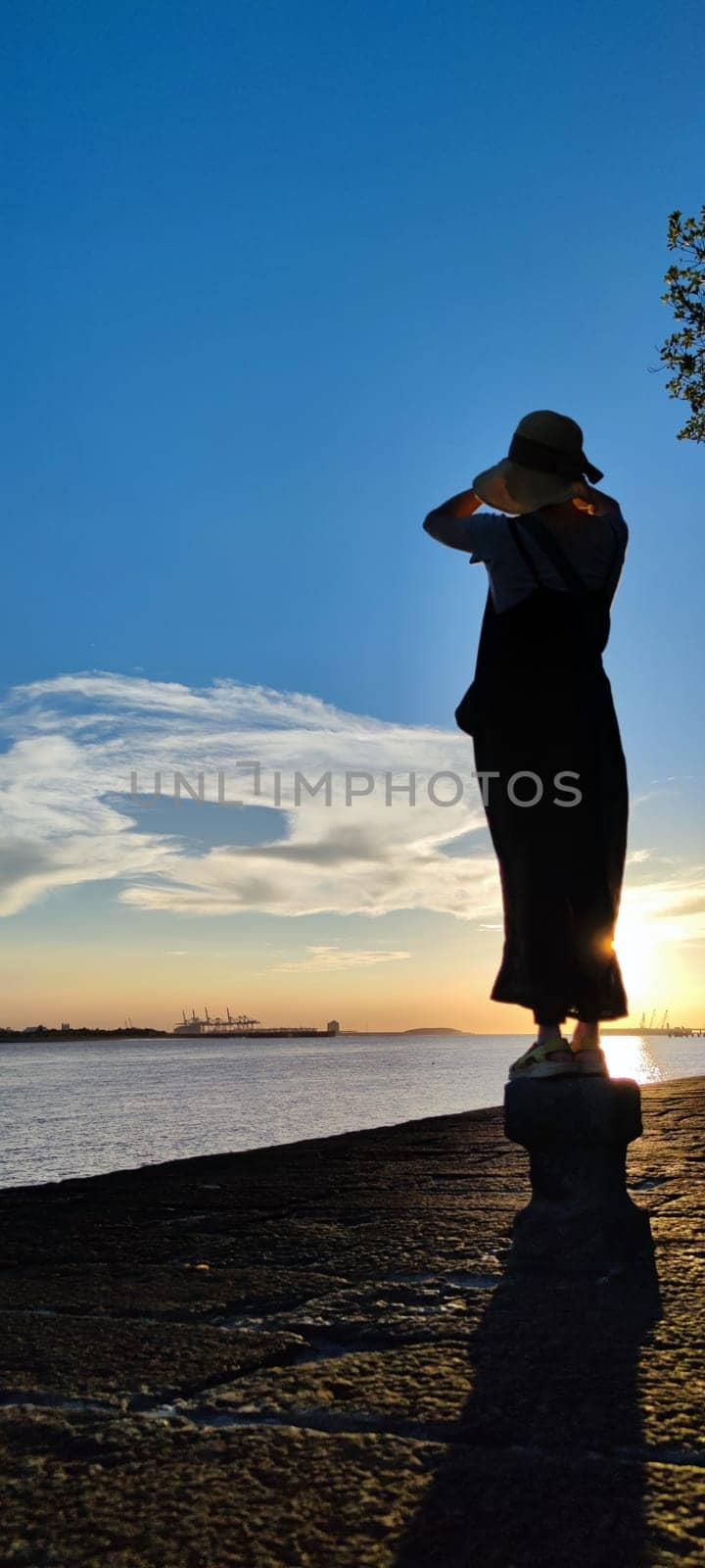Tamsui, NEW TAIPEI CITY, TAIWAN - Sep 8, 2021 - City Tamsui Bali District in Taipei, Taiwan reflecting in the Tamsui River at nice day