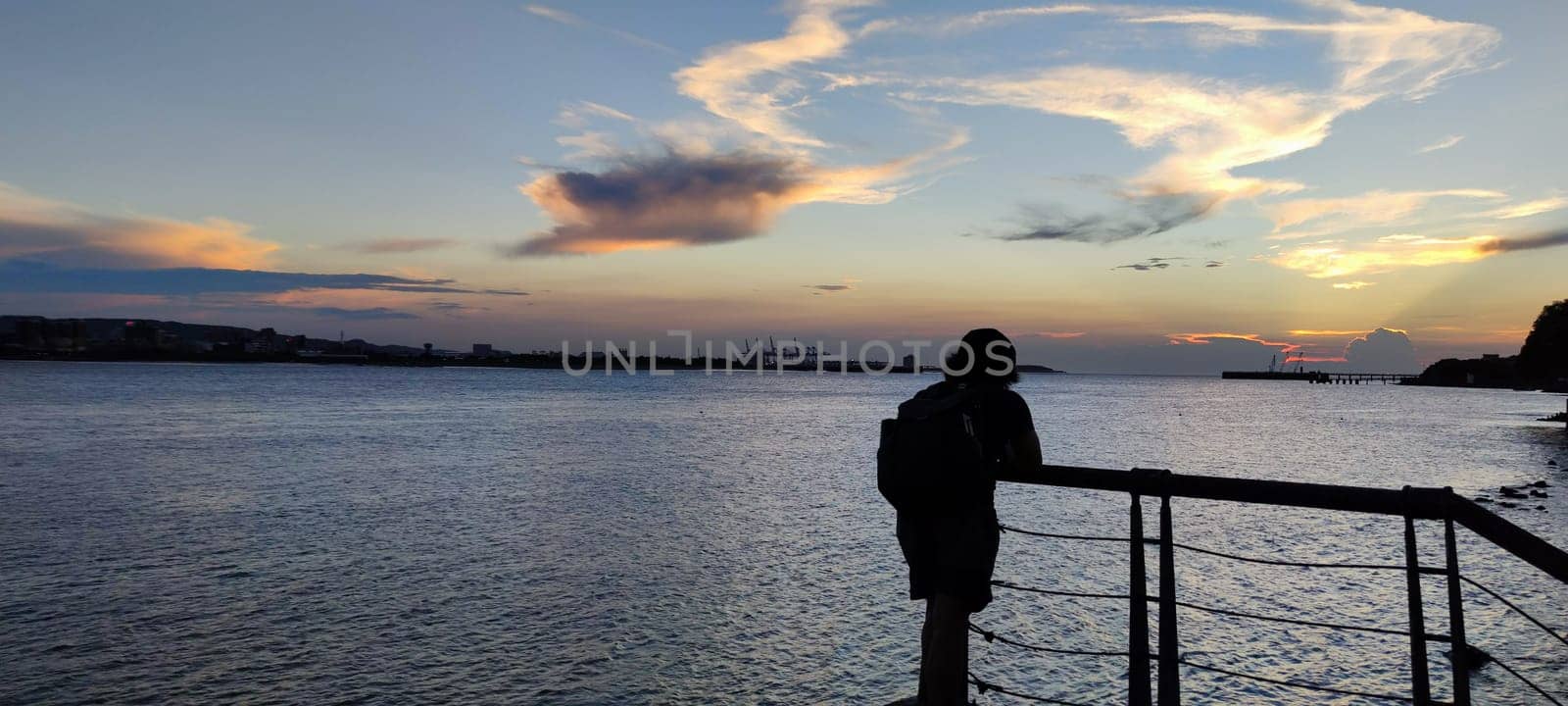 Tamsui, NEW TAIPEI CITY, TAIWAN - Sep 8, 2021 - City Tamsui Bali District in Taipei, Taiwan reflecting in the Tamsui River at nice day