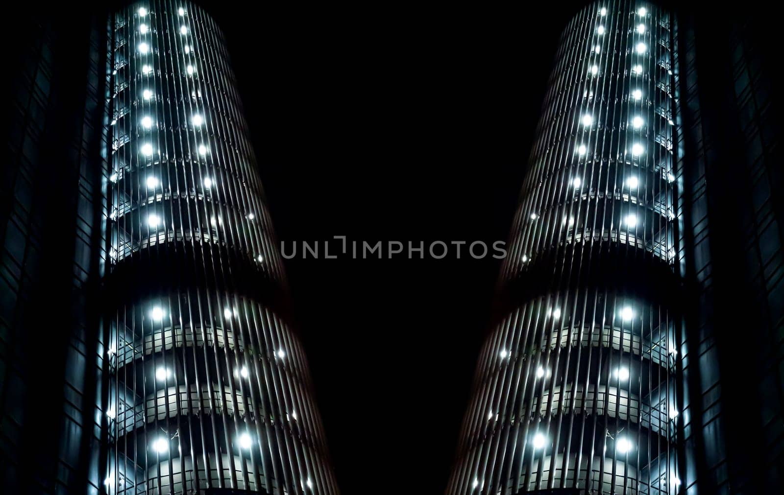 Abstract geometric image of a building night illumination. Night lighting. Office building. UFO. Spaceship. Alien civilization. Background image. Template for text. Business.