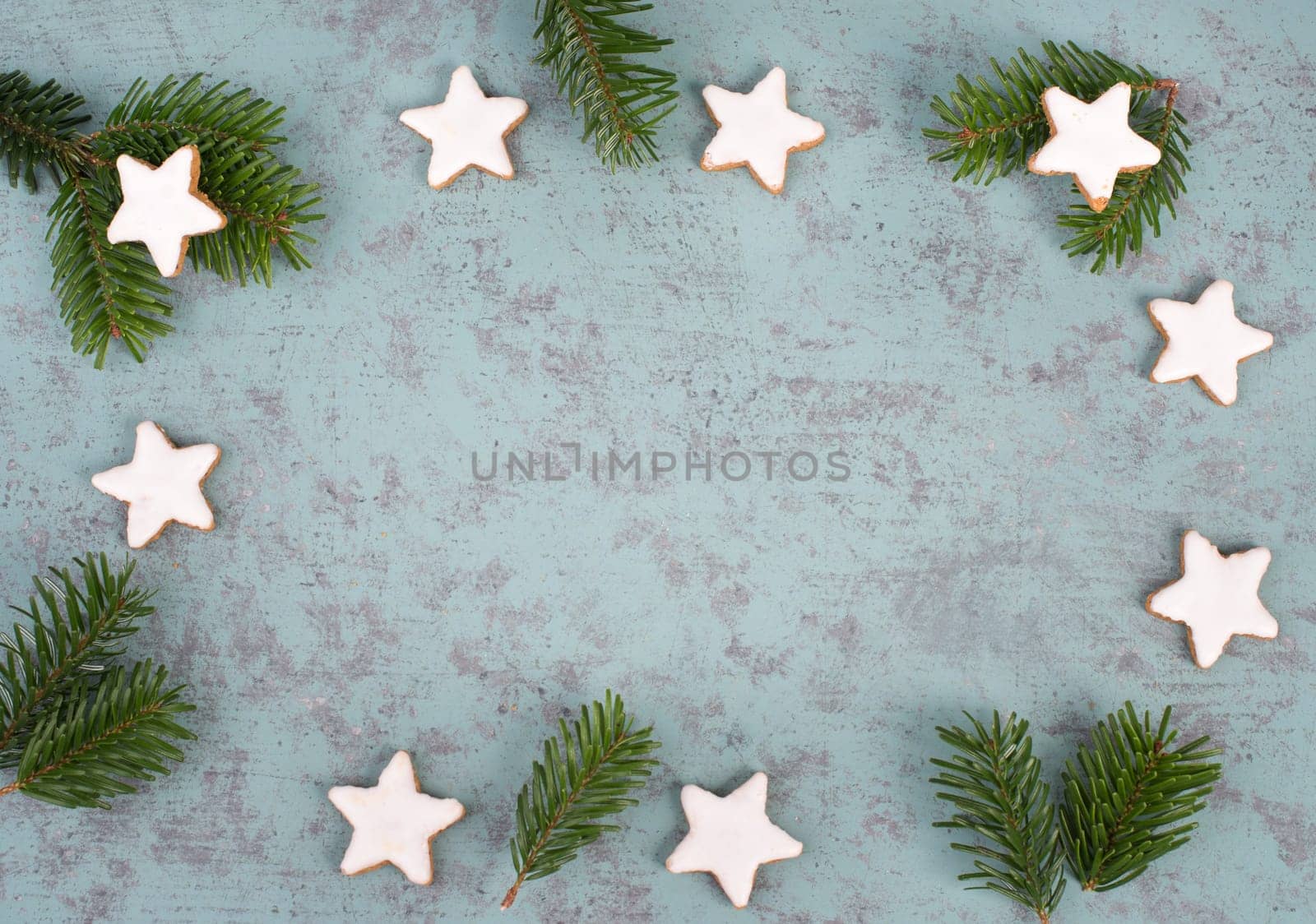 Cinnamon stars, traditional german christmas cookies, gingerbread, empty copy space, fir branch