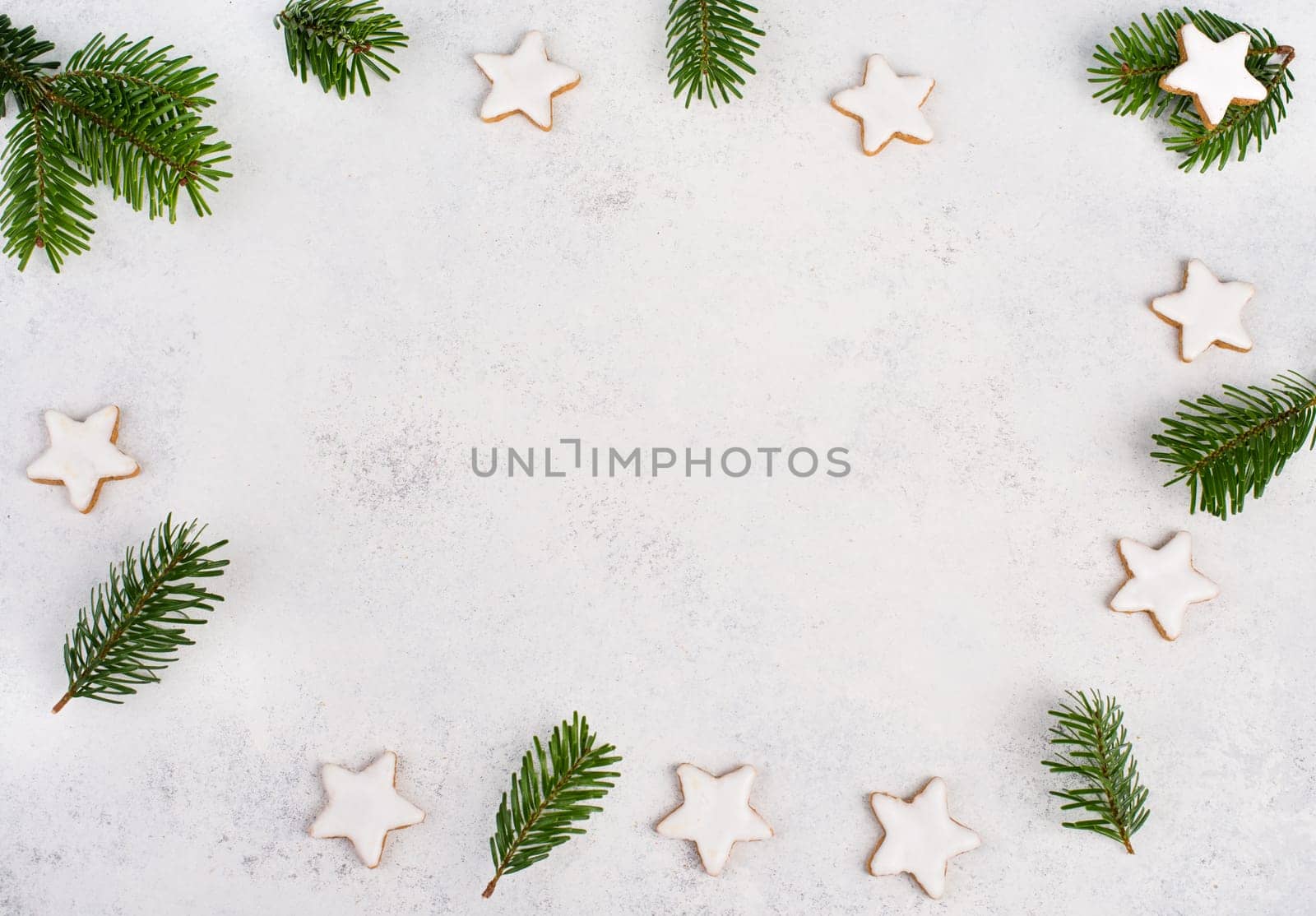 Cinnamon stars, traditional german christmas cookies, gingerbread, empty copy space, fir branch