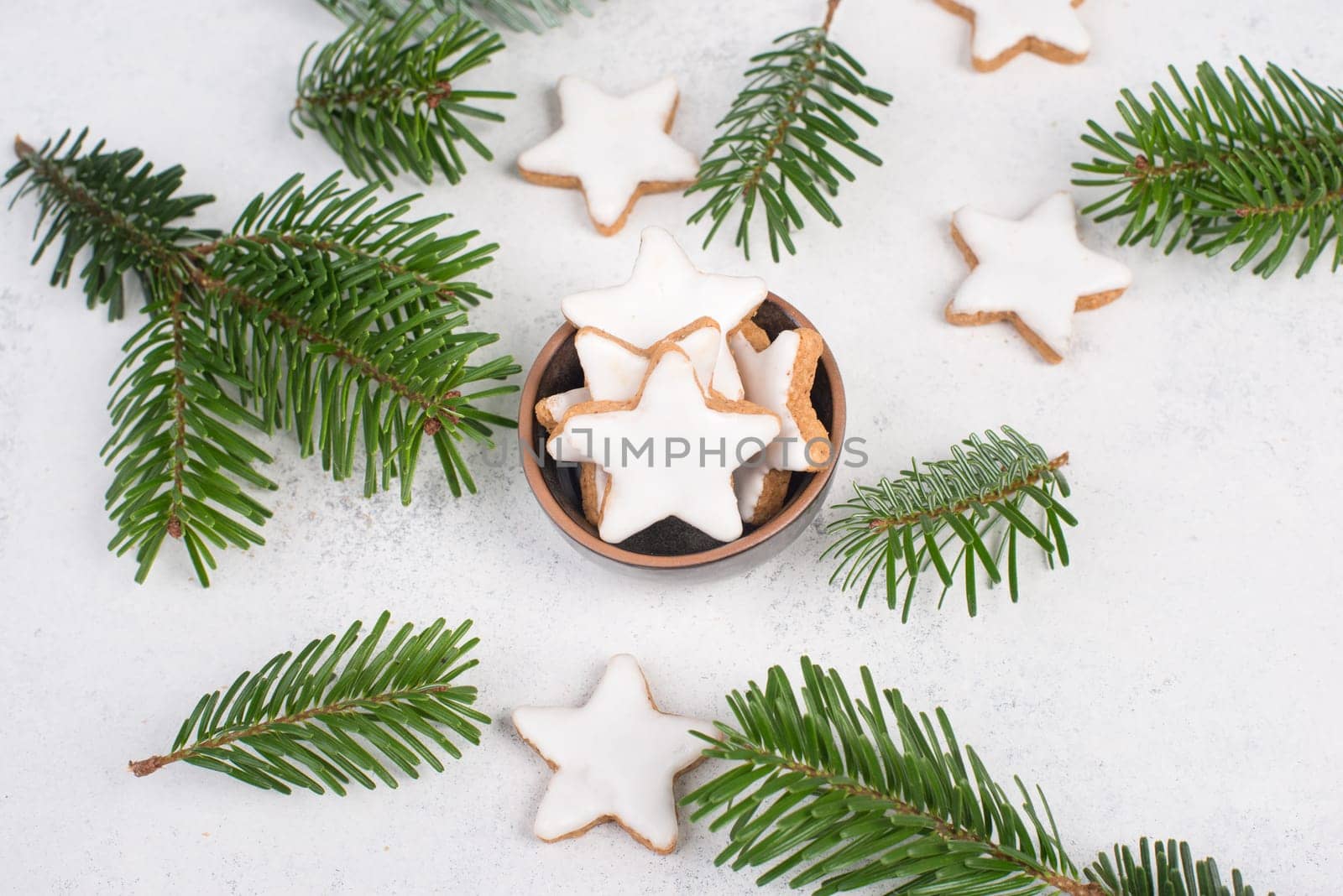 Cinnamon stars, traditional german christmas cookies, gingerbread, empty copy space, fir branch