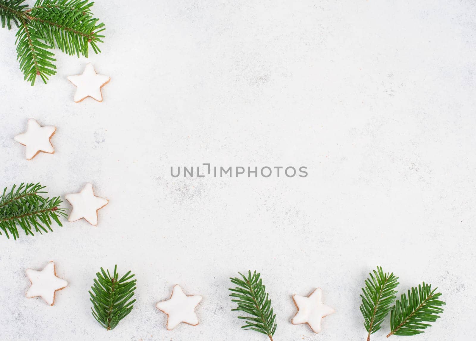 Cinnamon stars, traditional german christmas cookies, gingerbread, empty copy space, fir branch