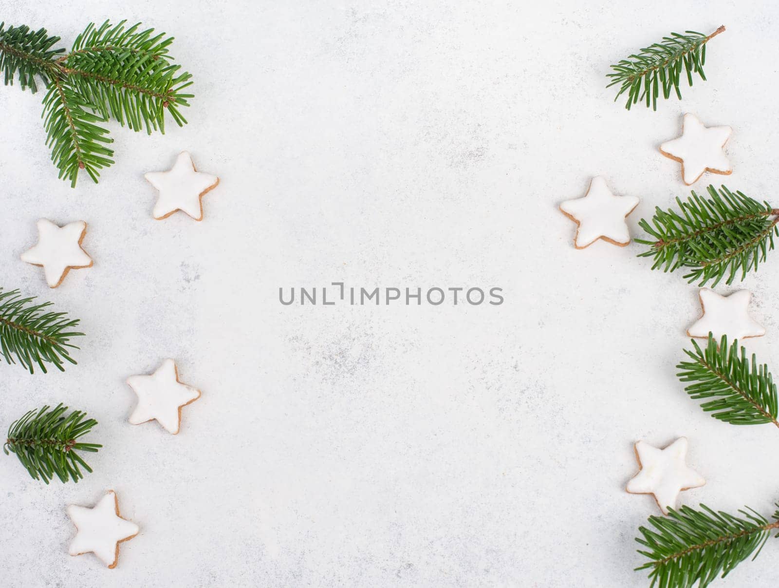 Cinnamon stars, traditional german christmas cookies, gingerbread, empty copy space, fir branch