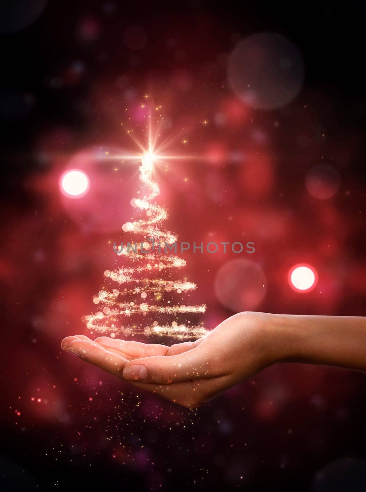Red Christmas tree in hand. Christmas Tree, beautiful lights, stars and snowflakes