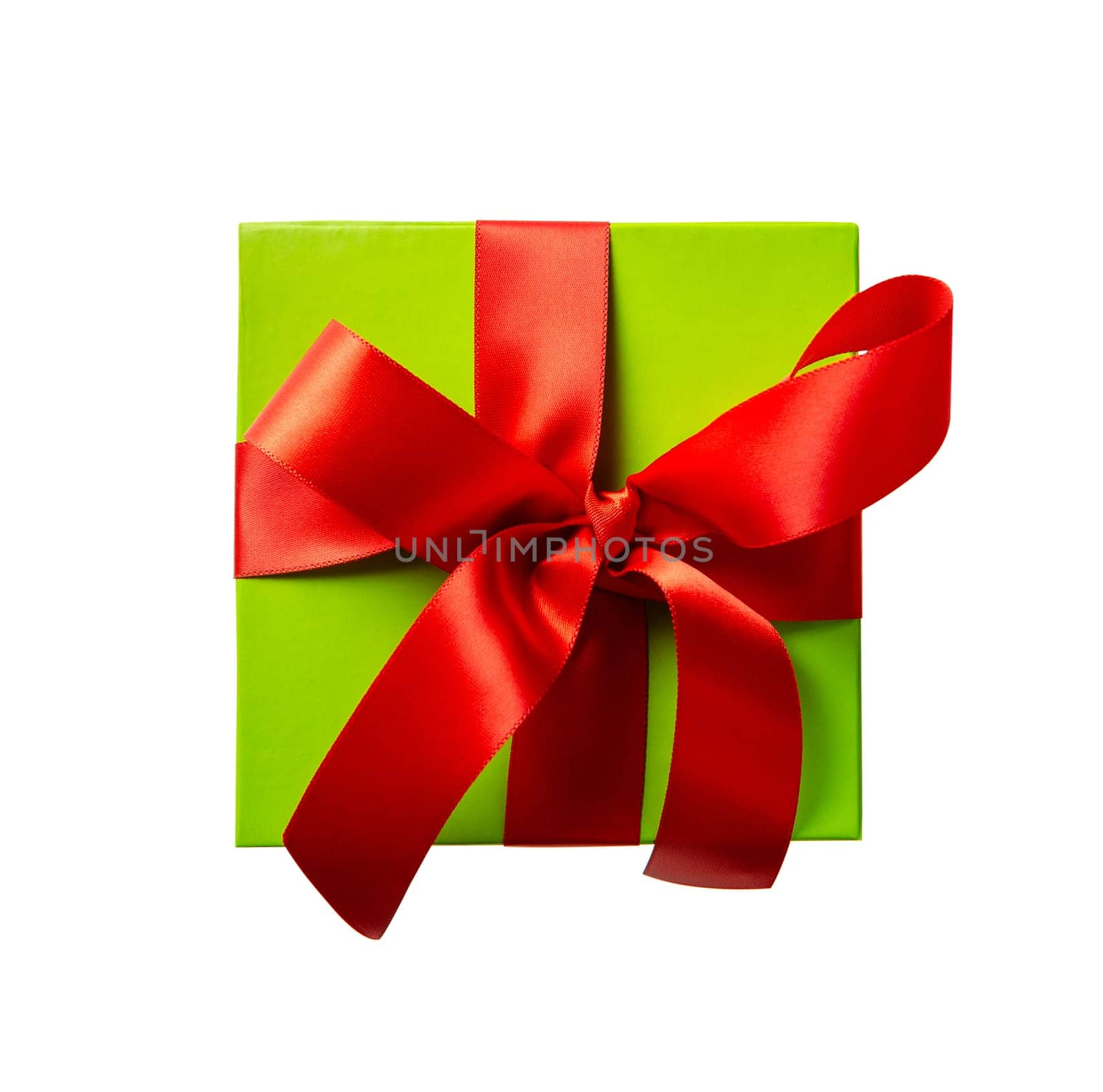 Top view of green gift box with red ribbon isolated on white background