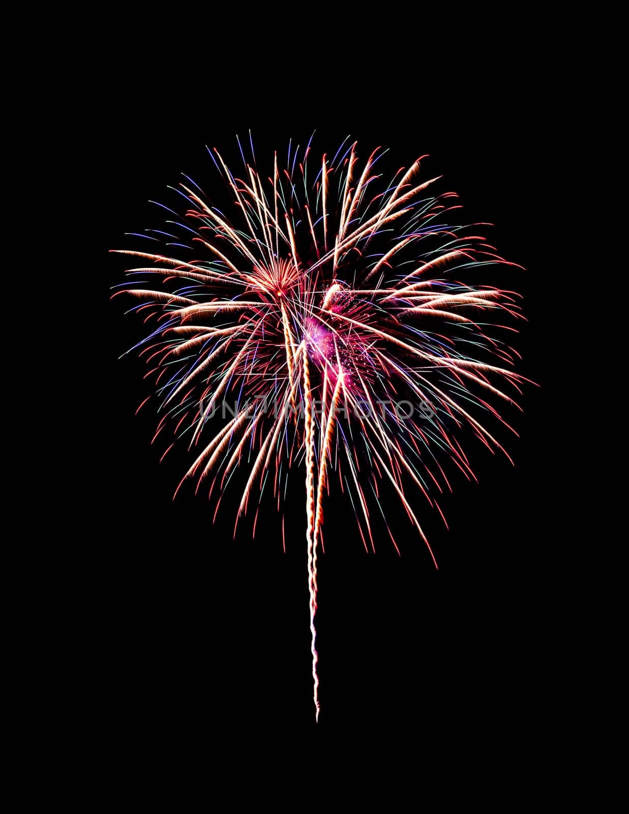 Beautiful colorful fireworks exploding in the night sky, isolated on black background. New year and anniversary concept.