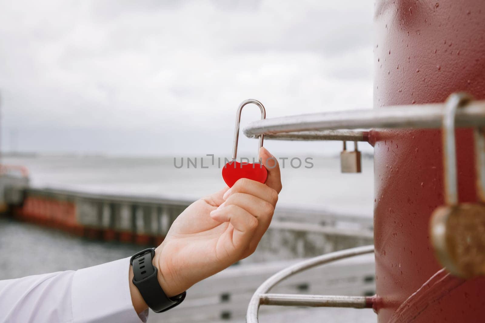 The bride and groom locks. Newlyweds hang the lock symbolizing everlasting love on the wedding day.