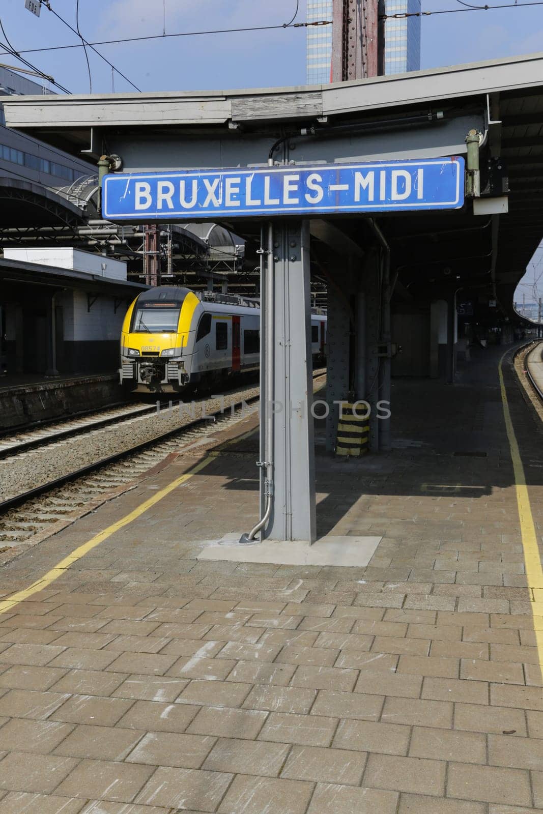 Rail tracks and trains in the Brussels South Railway Station