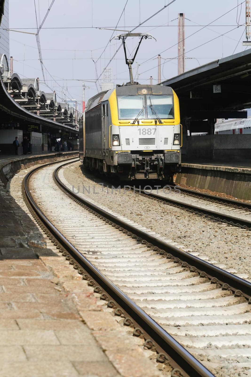 Rail tracks and trains in the Brussels South Railway Station