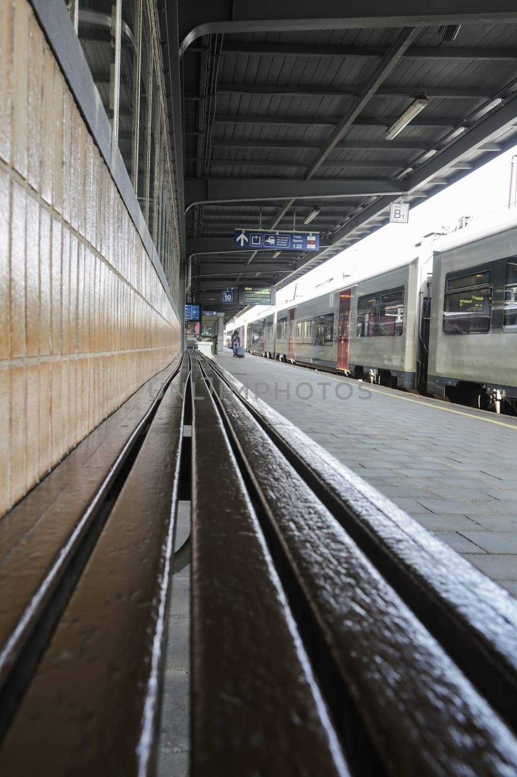 Rail tracks and trains in the Brussels South Railway Station