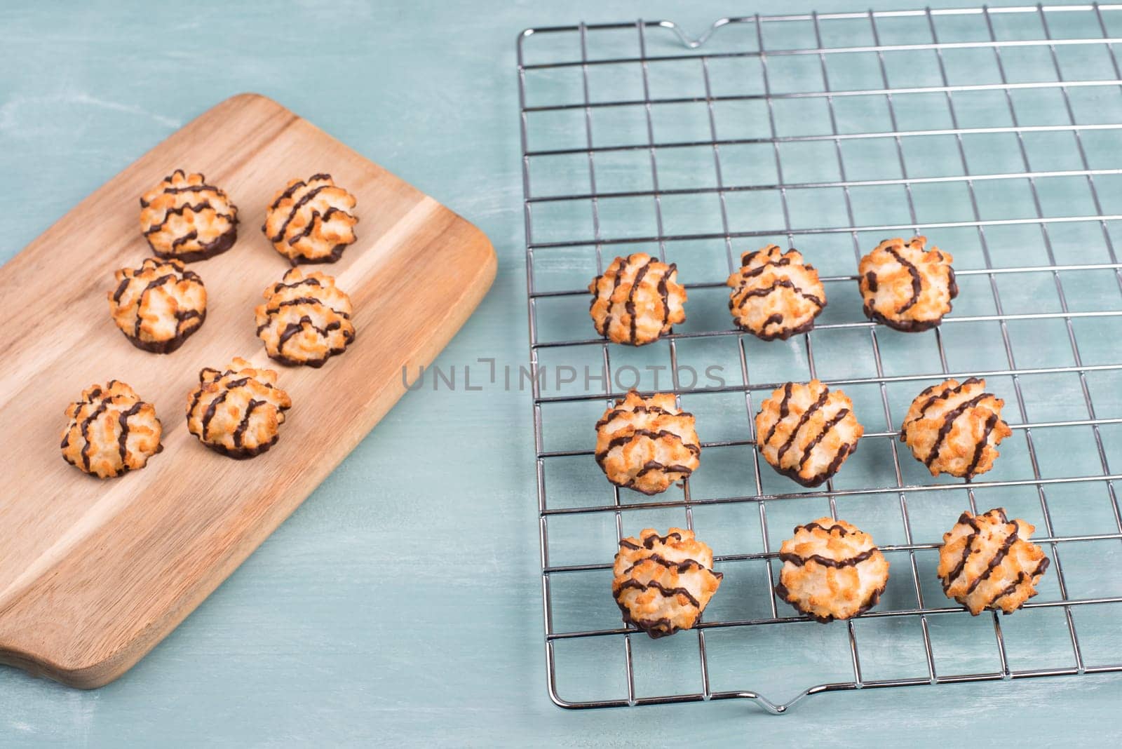 Coconut macaroons on a textured blue background