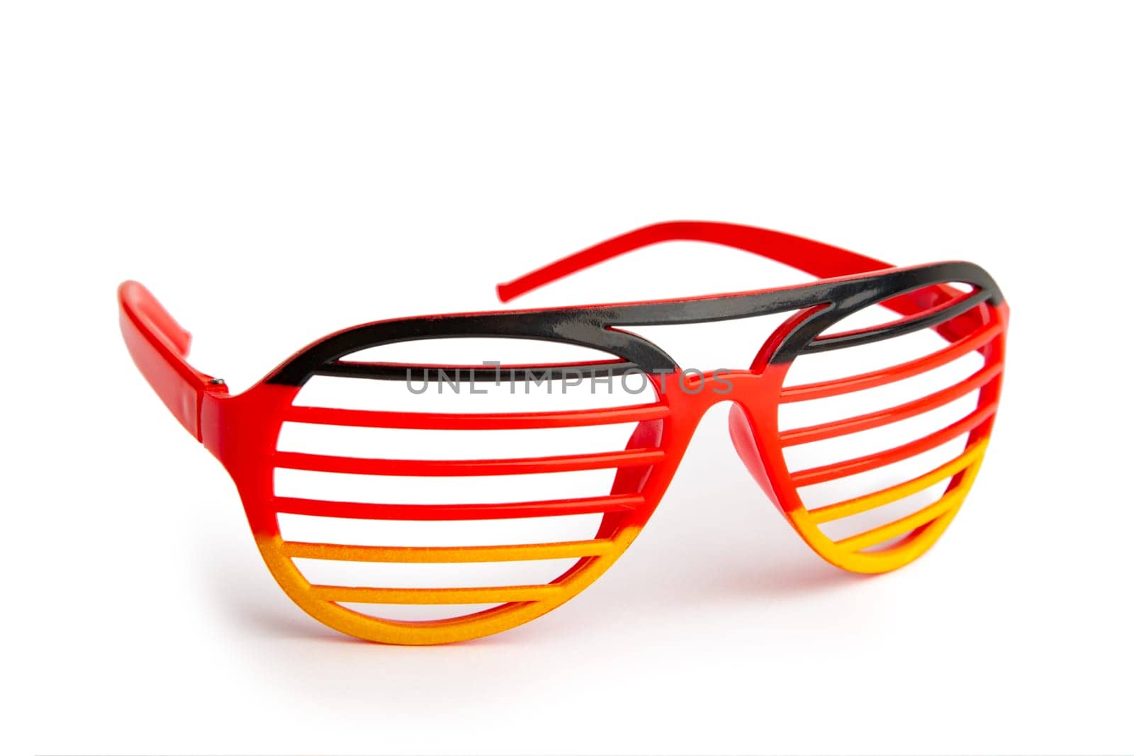 Funny eyeglasses in german national colors over white background