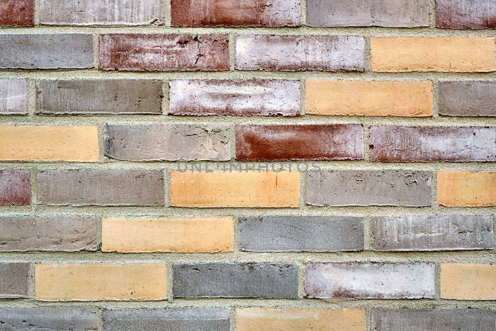 Background from a multicolored brick wall
