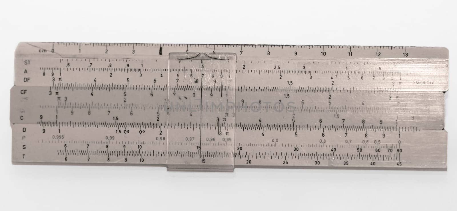 Picture of an old slide rule from GDR times that the students used. Antique calculator.