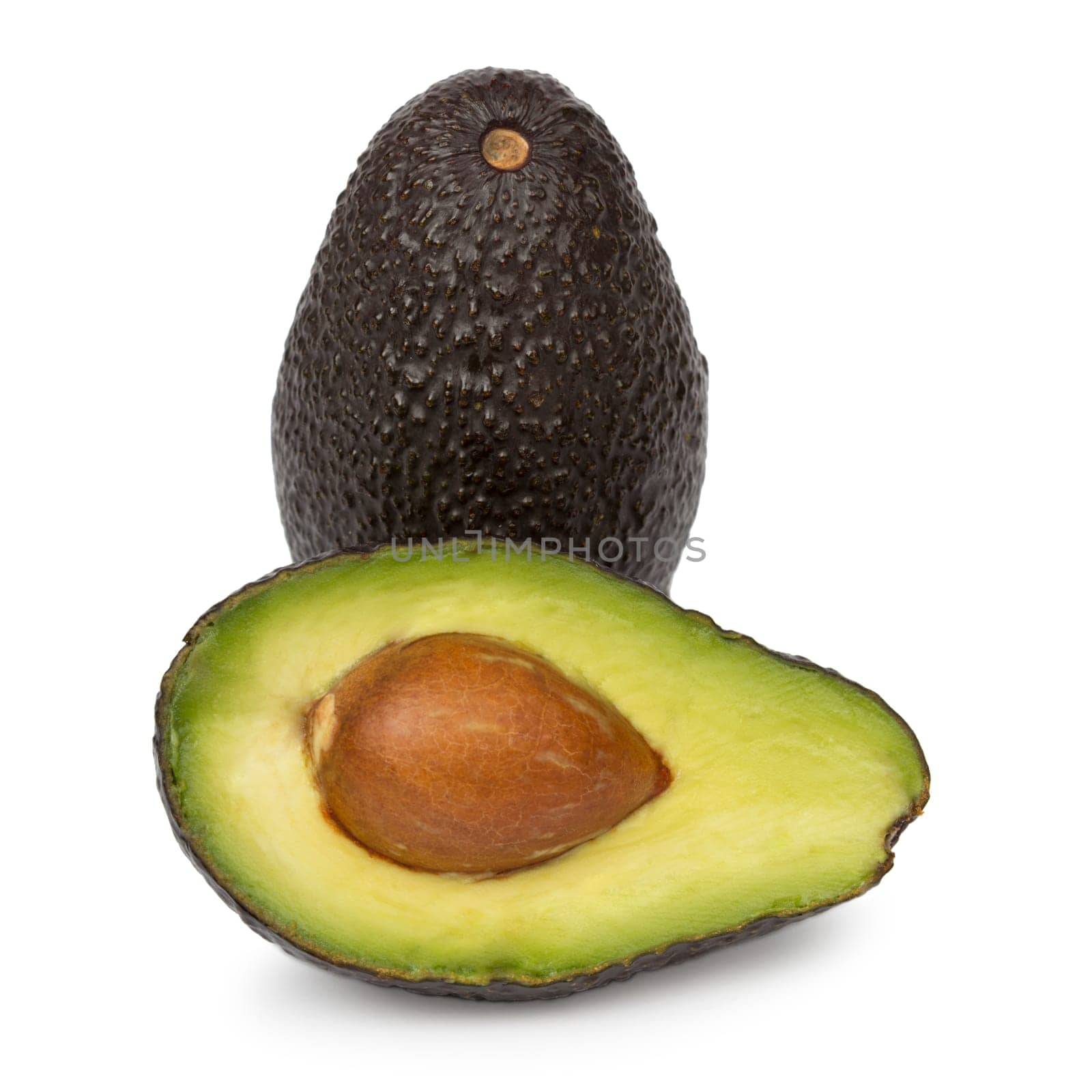 Whole avocado and half of avocado isolated on white