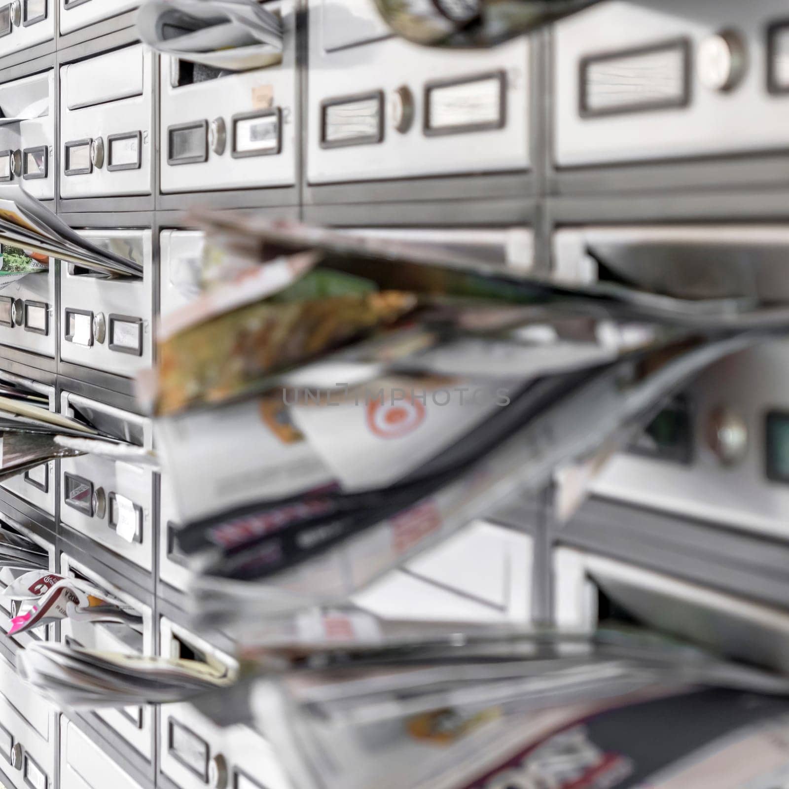 mailboxes filled of leaflets. Business and advertising concepts. Shallow dof.