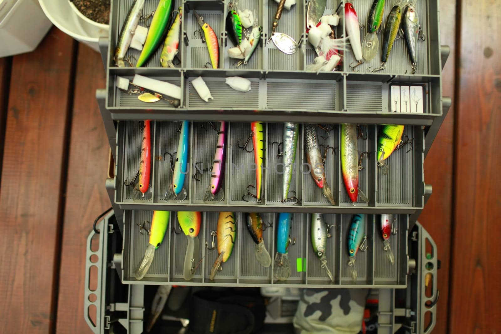 fisherman is inspects, checks the the fishing box