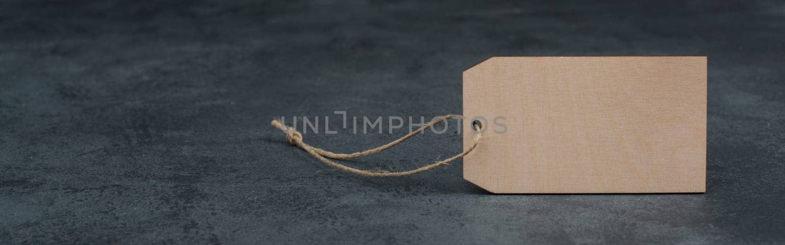 Empty wooden tag, copy space for text