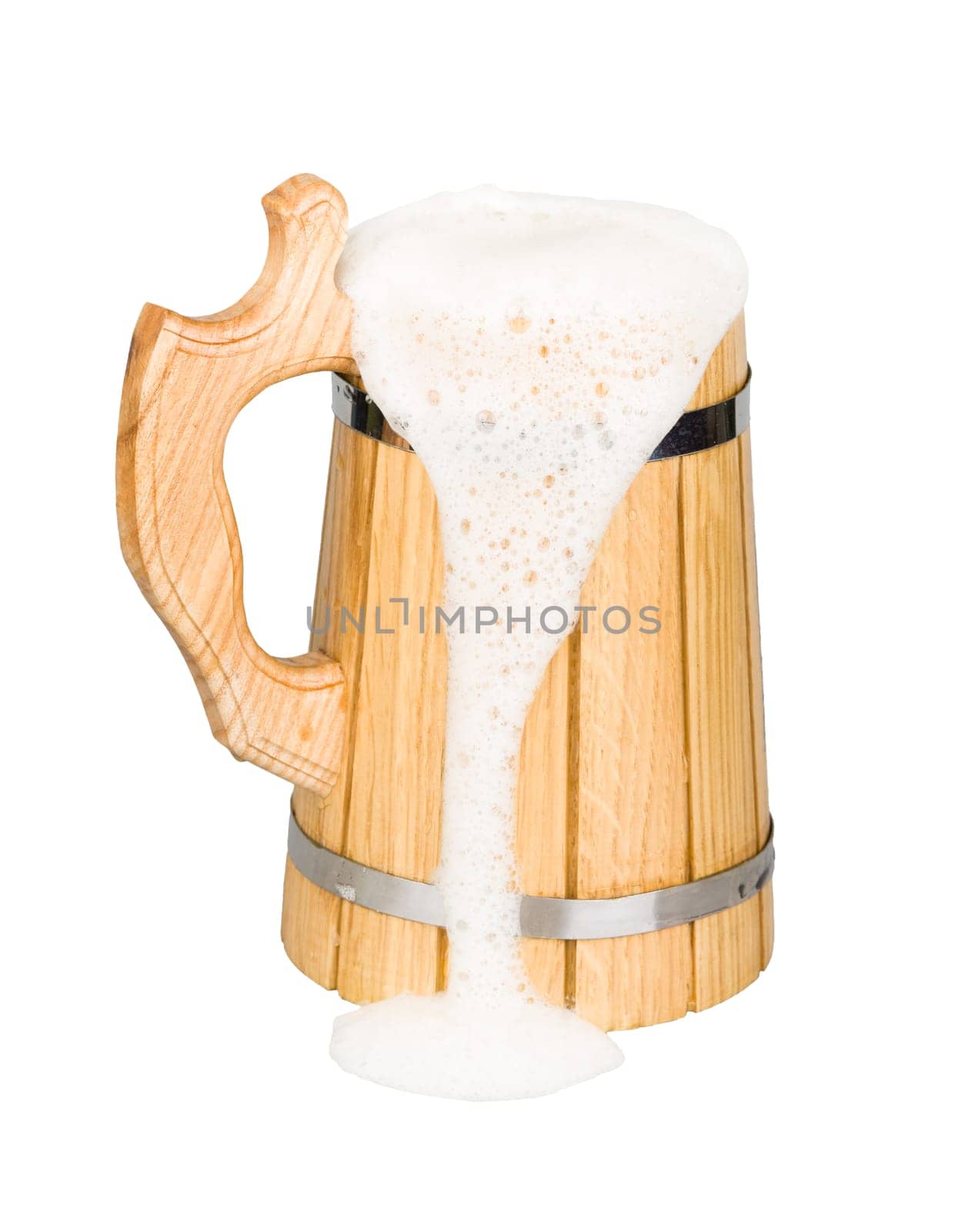 Wooden beer mug with beer isolated on white
