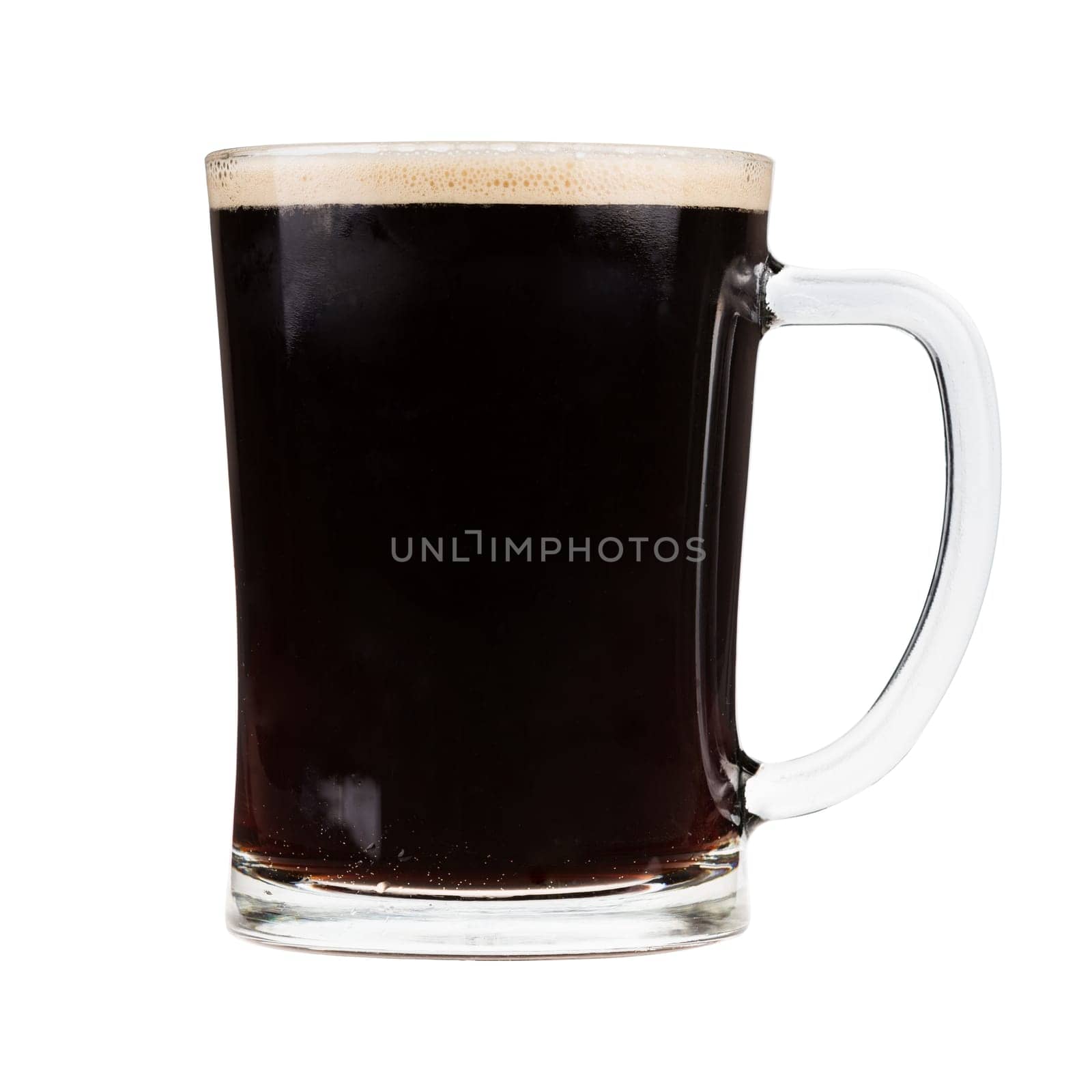 Glass mug filled with dark stout beer
