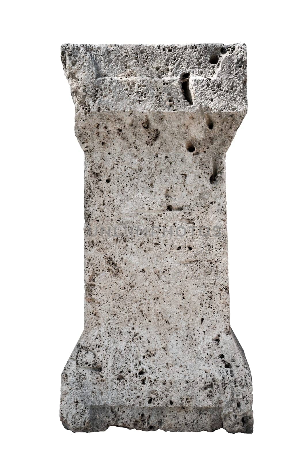 front view closeup of large antique classical stone column with weathered texture isolated on white background