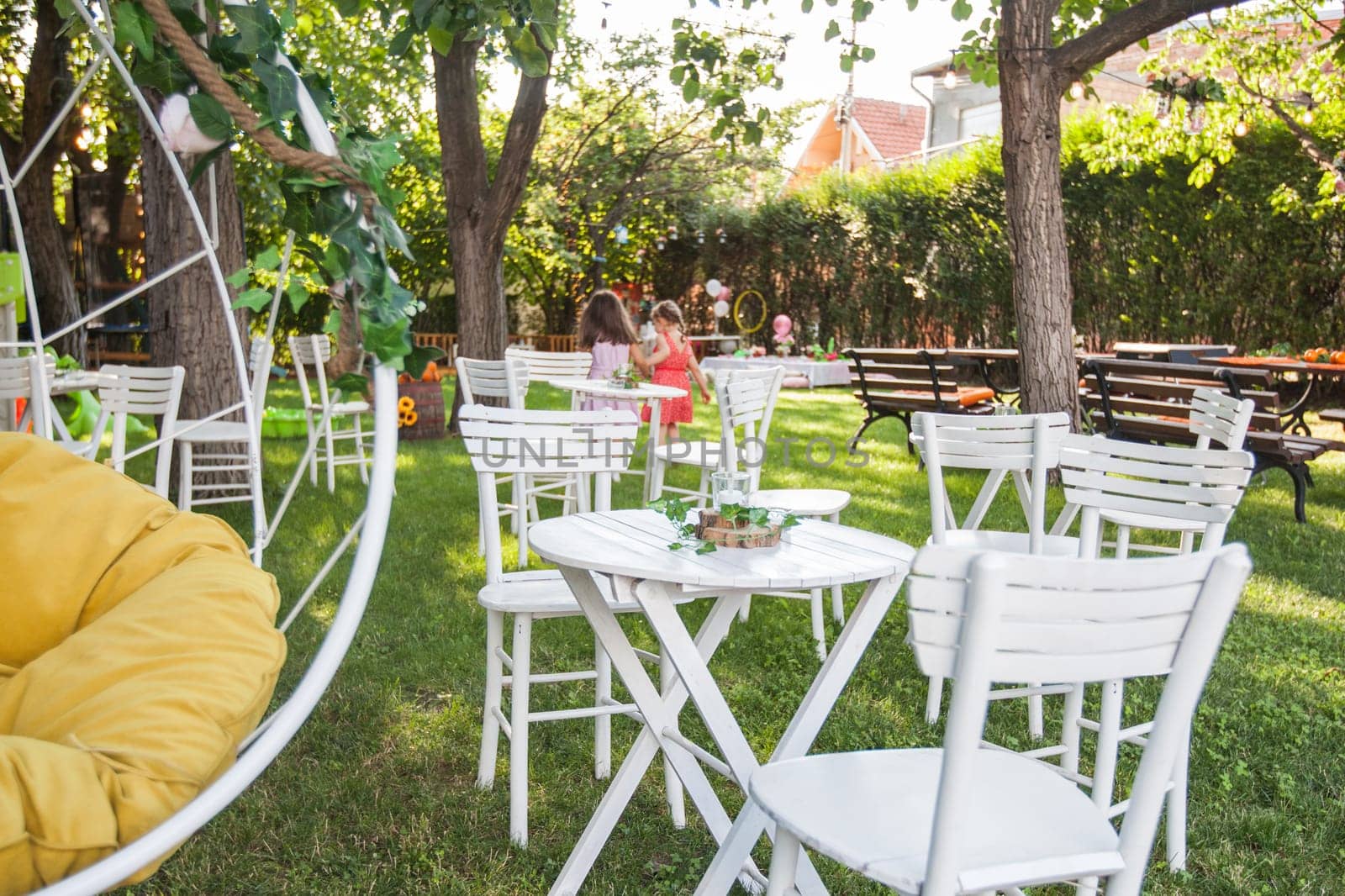 Beautiful birthday rustic decoration in summer garden, natural light, daylight , summertime