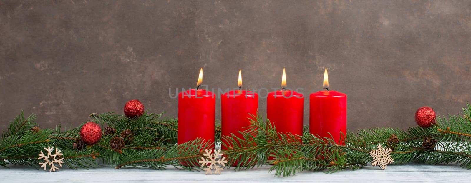Red candles on a advent wreath, christmas decoration with candlelight