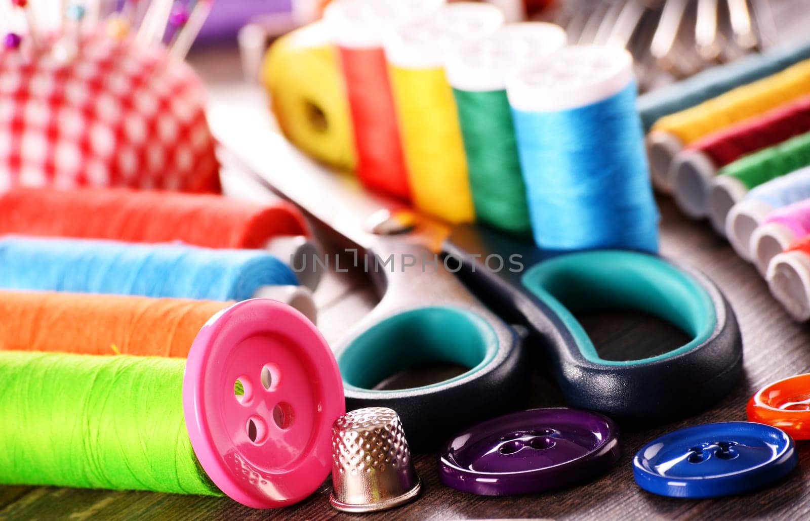 Composition with tailor accessories on wooden table