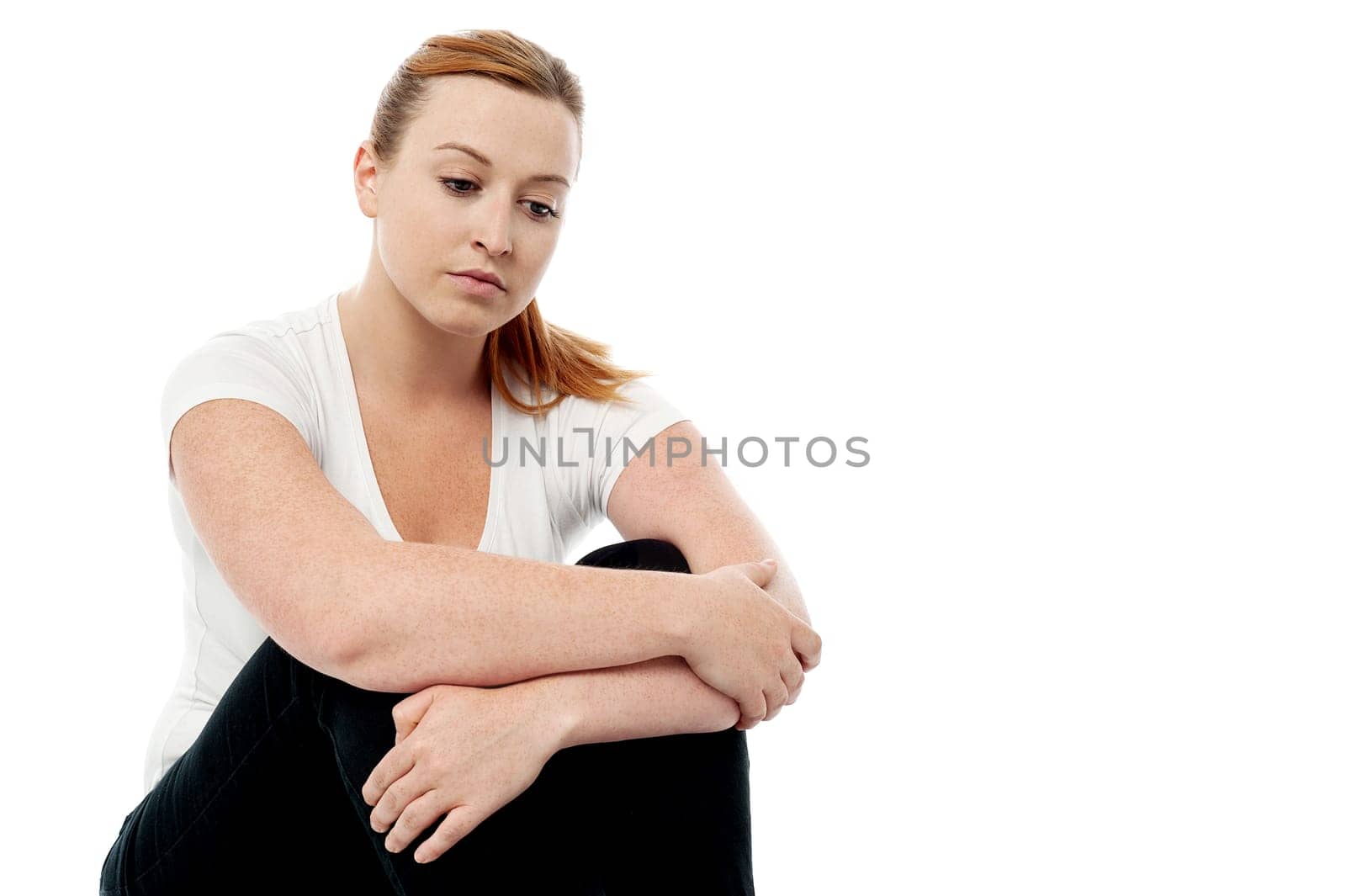 Sad woman looking thoughtful about troubles