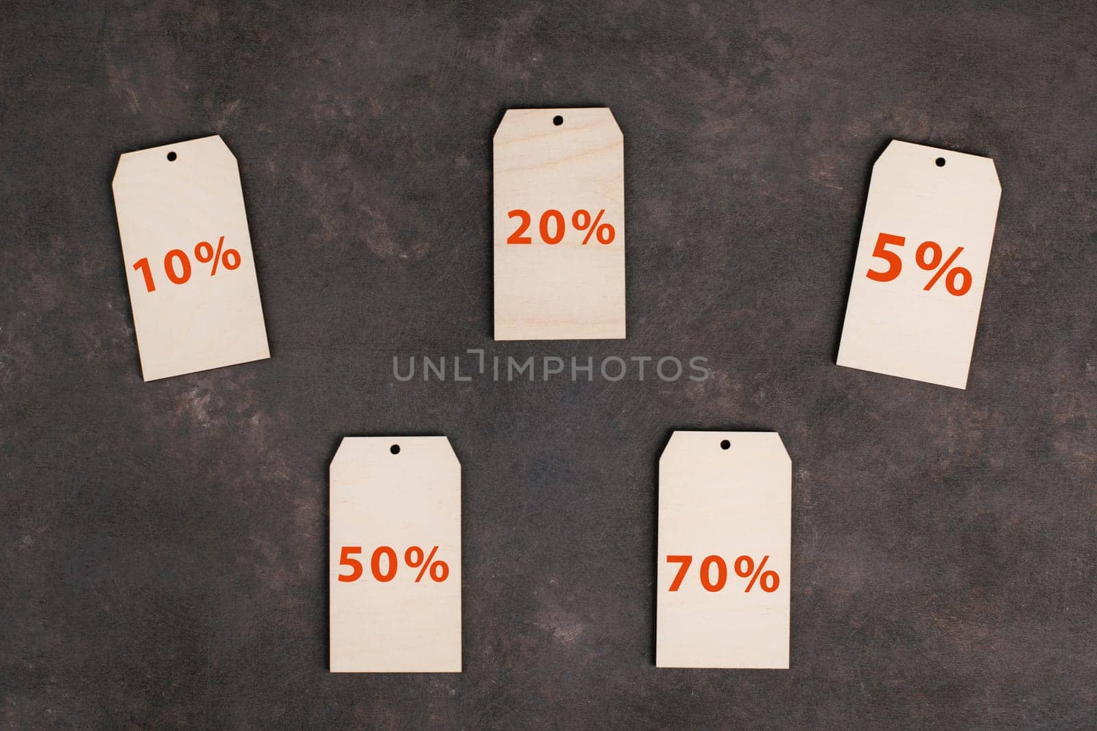 Price labels from with different discounts on a dark background