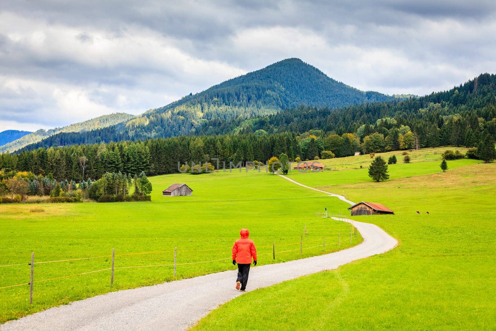 Hiking along a small gravel road near Schwangau in Bavaria, Germany