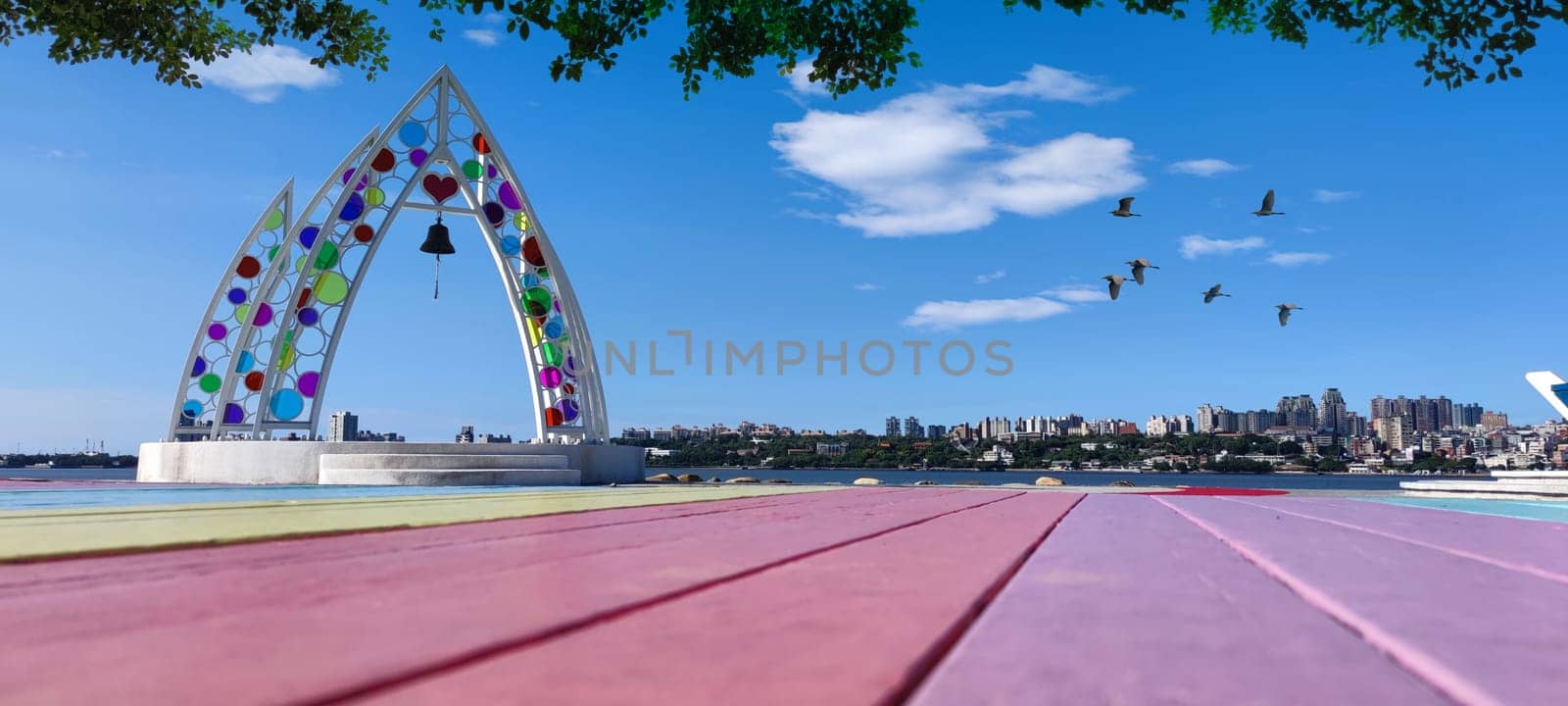 Tamsui, NEW TAIPEI CITY, TAIWAN - Sep 8, 2021 - City Tamsui Bali District in Taipei, Taiwan reflecting in the Tamsui River at nice day