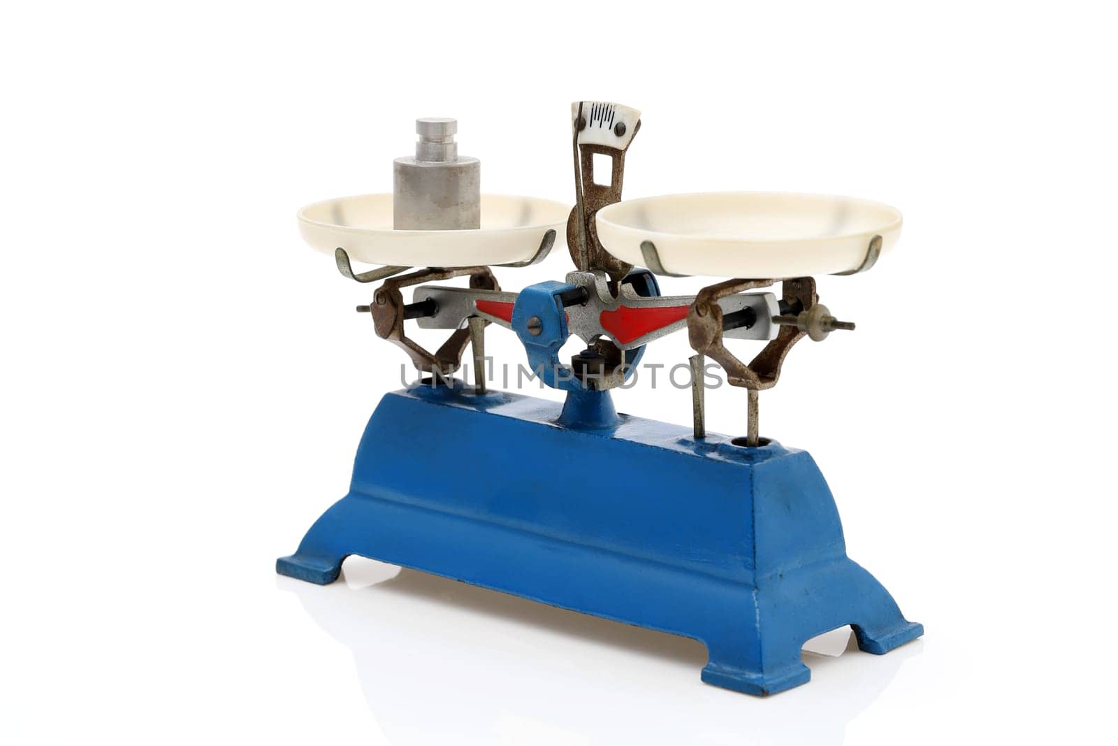 Retro roberval balance with weight, scale on a white background
