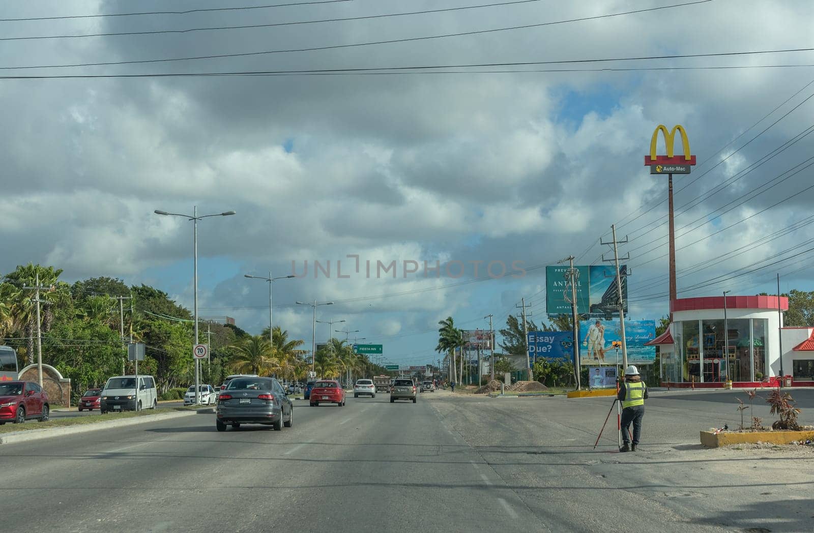 Car traffic on the Tulum-Cancun road, Quintana Roo, Mexico