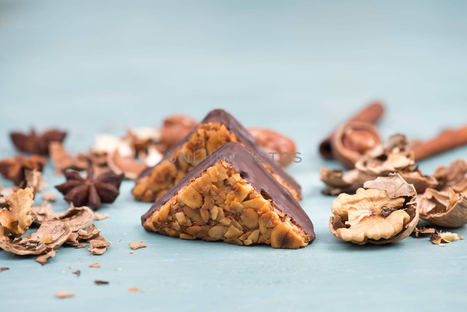 Nut corner, traditional german sweets called Nussecke, covered with chocolate, christmas baking