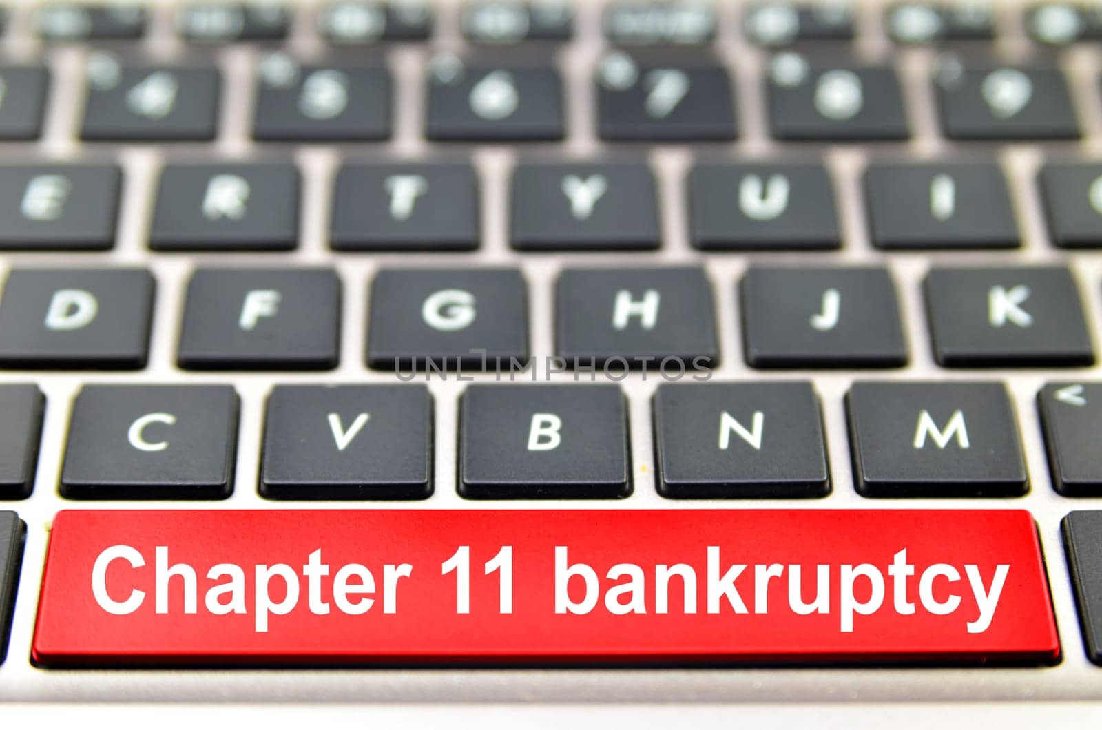 Chapter 11 bankruptcy word on computer keyboard, 3D rendering