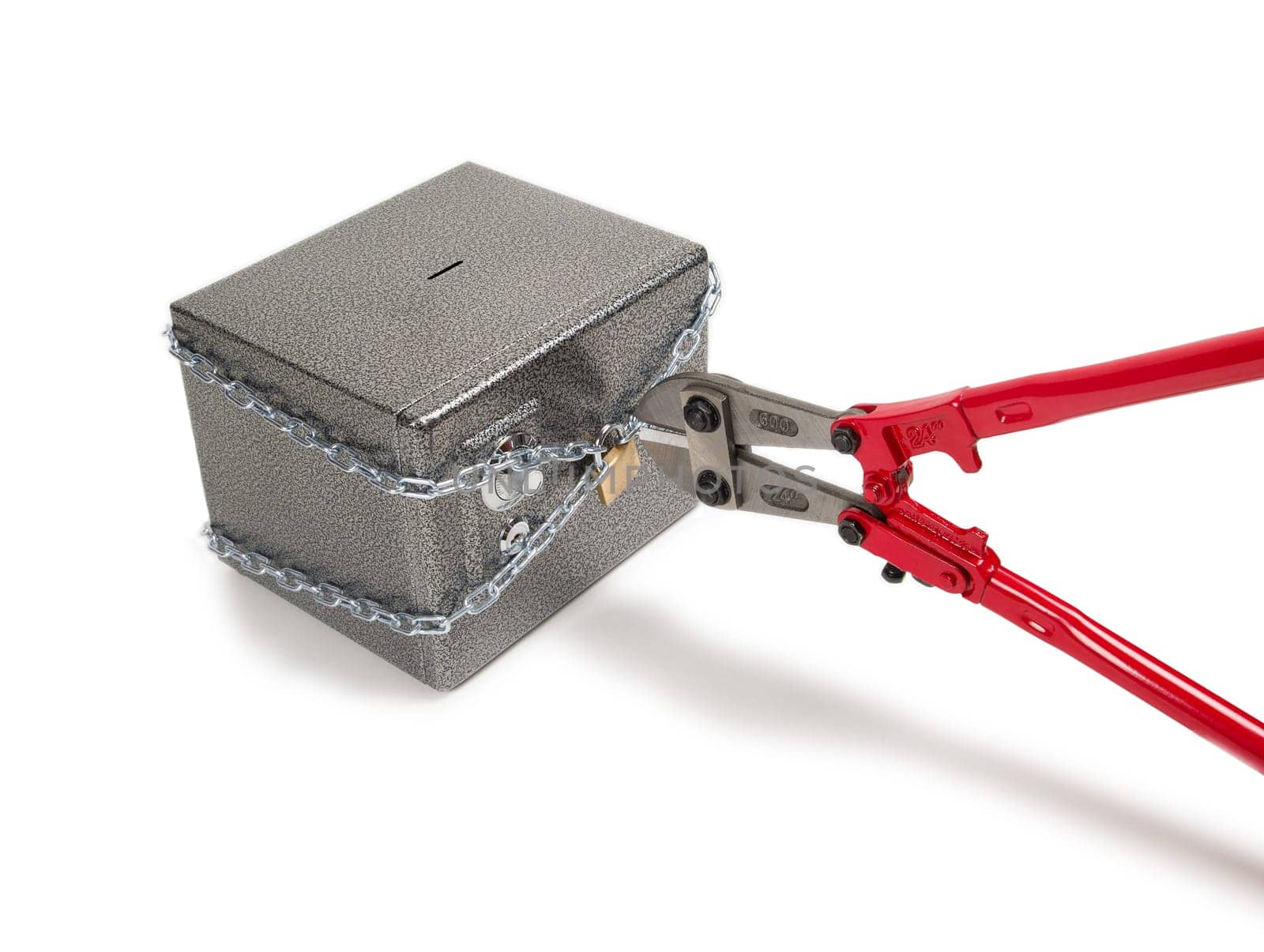 Cutting chain on safe with bolt cutters. Robbery concept.