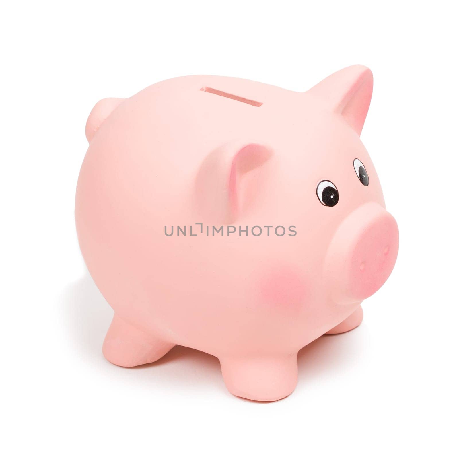 Pink ceramic piggy bank, isolated on white background. Bank savings, economy, financials investments, saving to buy a house, a car, for retirement concept.
