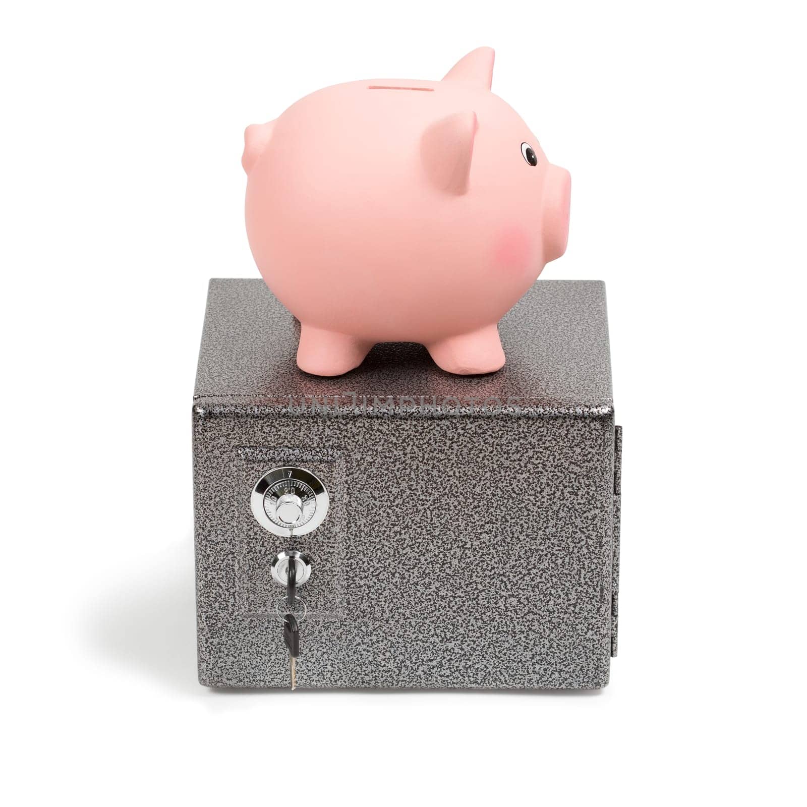 Pink ceramic piggy bank standing on a safe. Isolated on white background