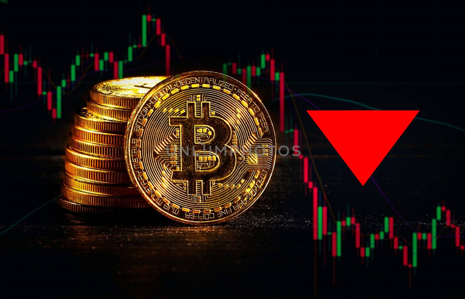 Golden coins with bitcoin logo drop at bear market. Pullback of leader cryptocurrency Bitcoin BTC in trading. Decentralized digital currency fell. Crypto collapse. Electronic money on black background