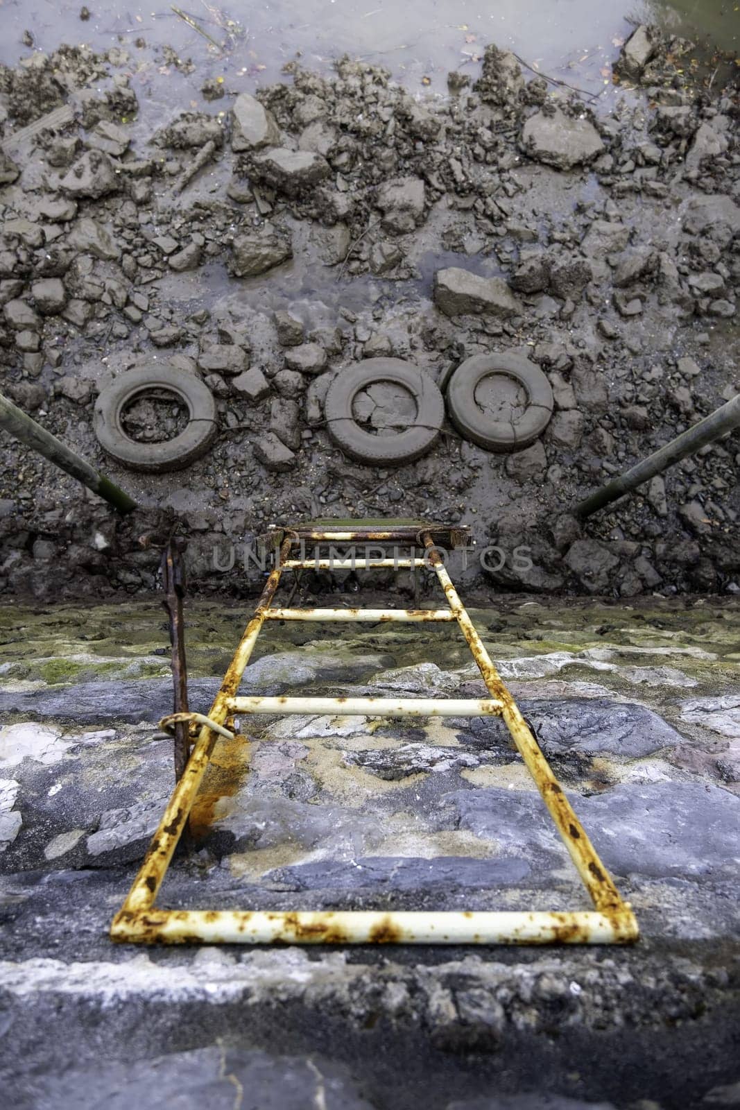 Detail of stairs to access the water in an old loading dock