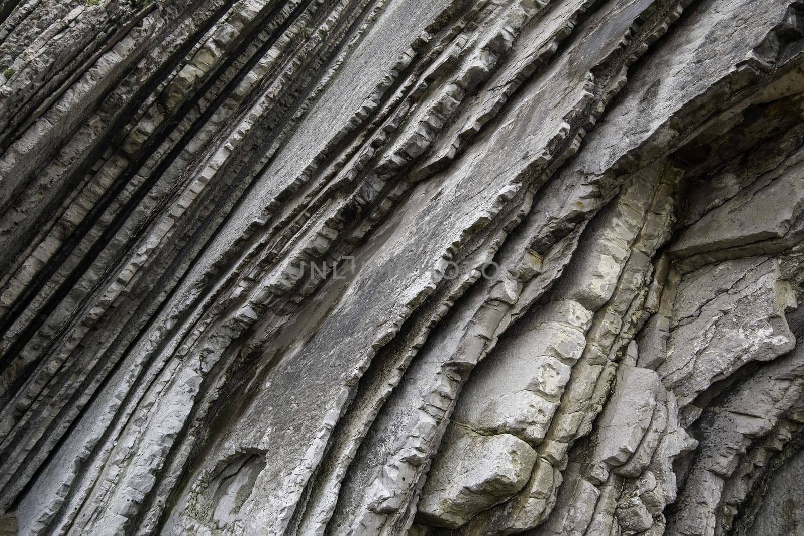 Detail of famous rock formation on a beach, erosion and nature, tourist attraction