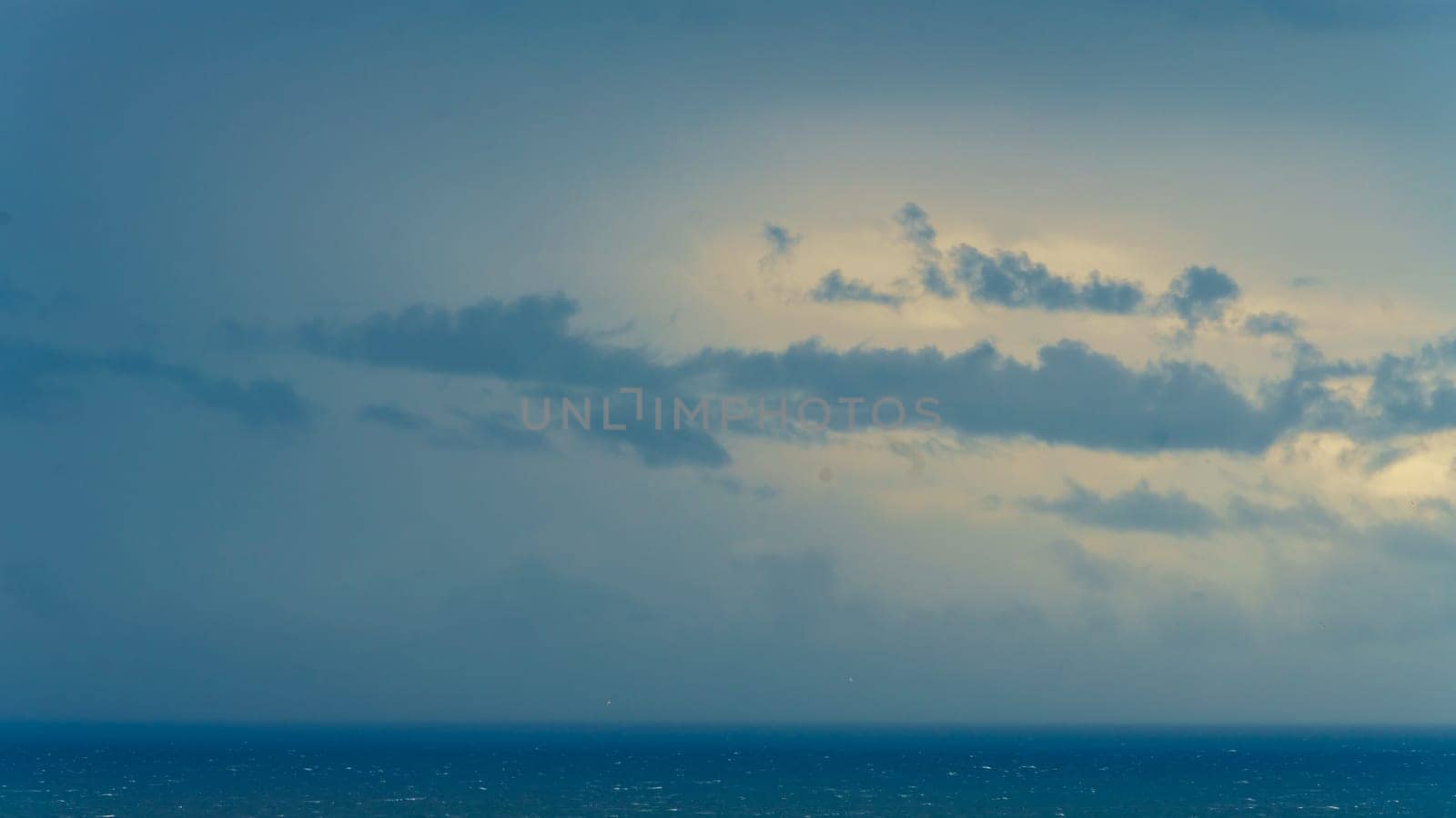Dark blue clouds and sea. storm, dramatic seascape