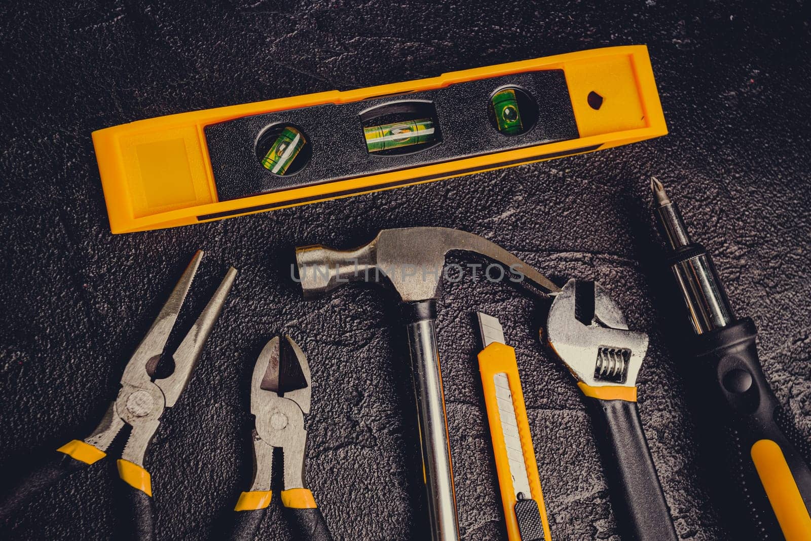 Tools for master builder on a black background