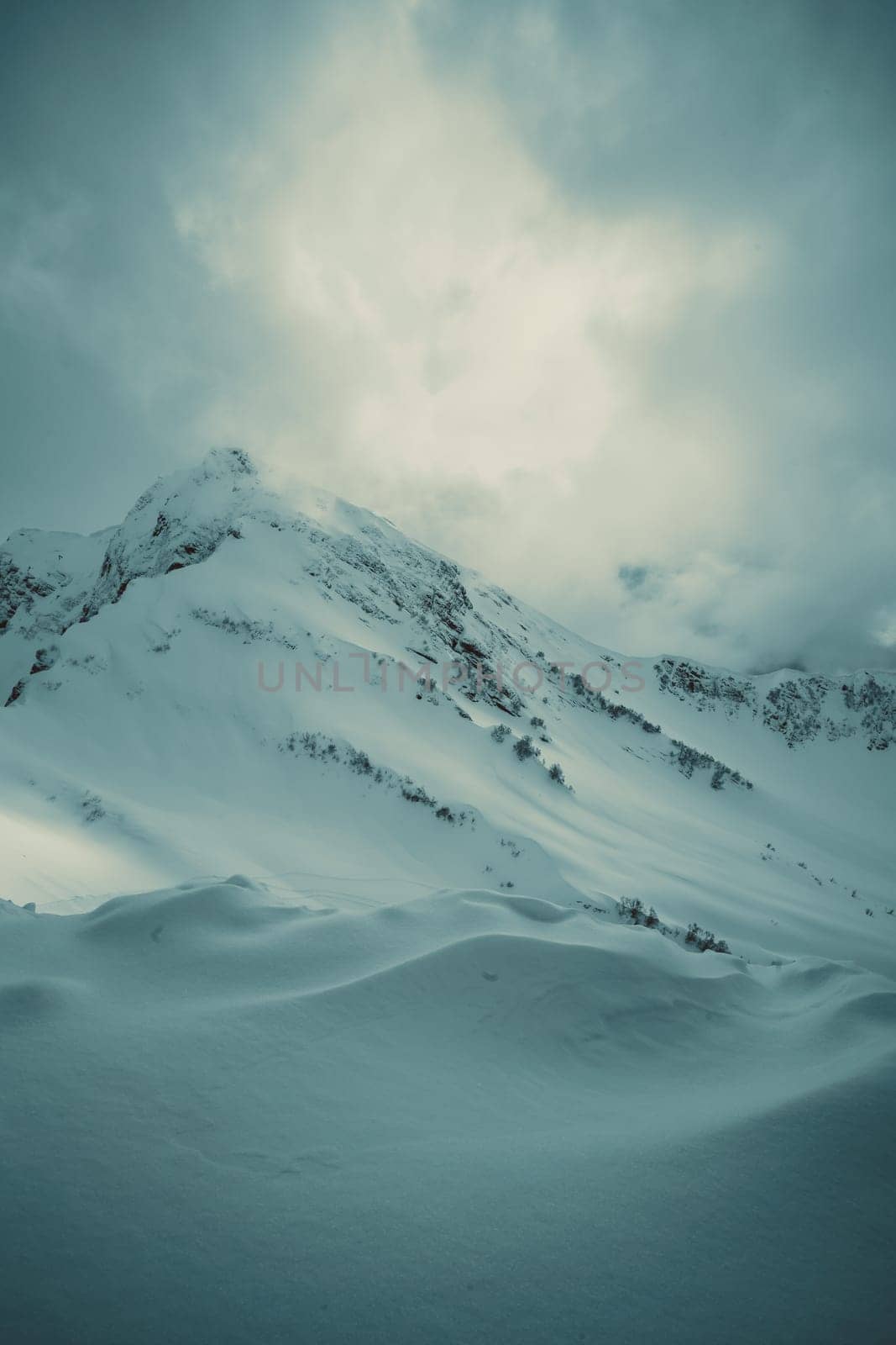 mountains with white snow and blue sky