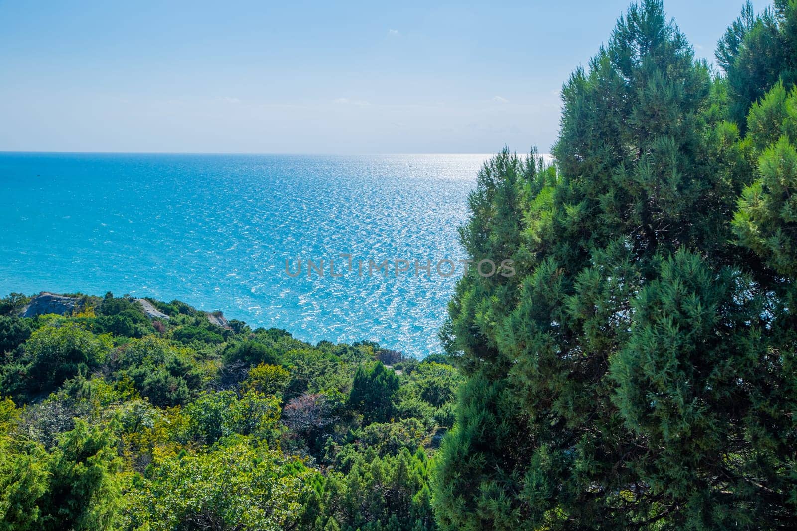 Blue sea against the sky, view from the cliff. . High quality photo