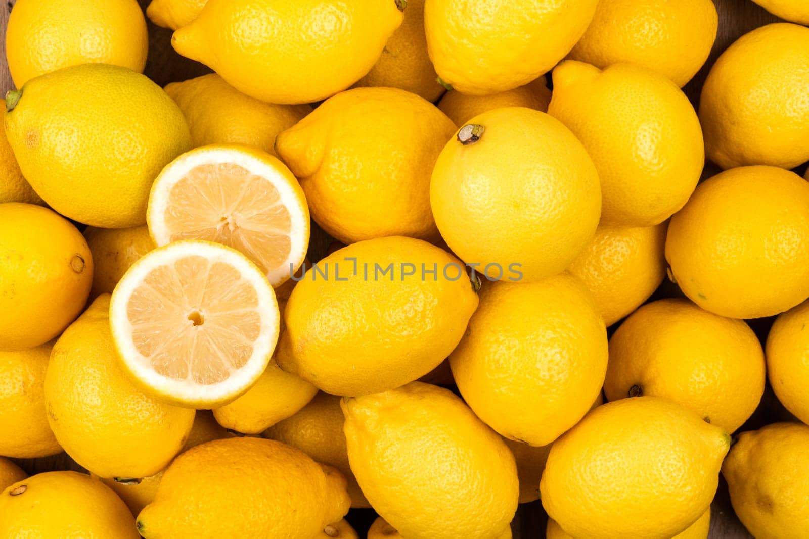 Yellow lemon fresh fruit as a background