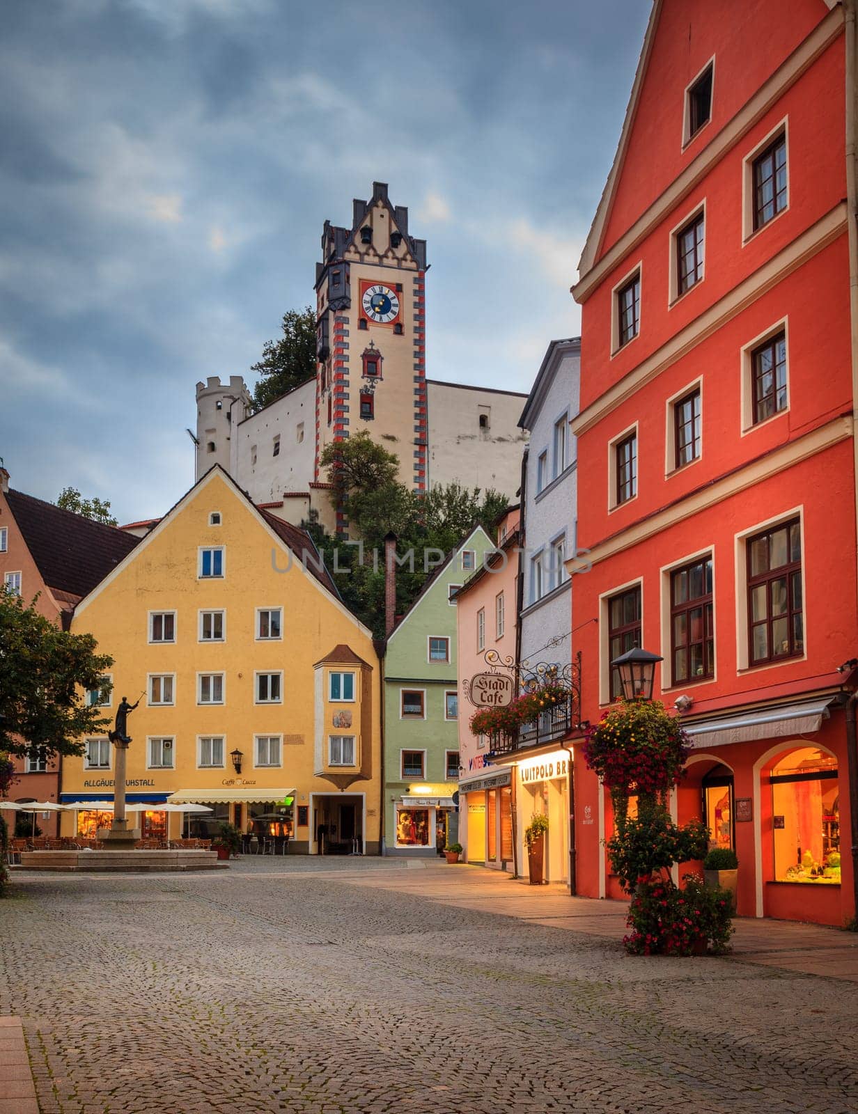 Fussen, Germany, September 27, 2015: Central square in Fussen featuring a landmark fountain - Stadtbrunnen