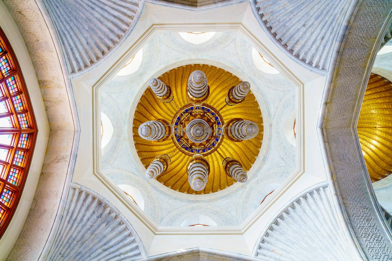 Muscat, Oman, December 4, 2016: The chandelier in the main prayer hall of the Muhammad al-Amin Mosque in Muscat, Oman